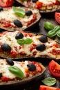 Healthy Eggplant or Aubergine pizza with tomato sauce, mozzarella cheese, basil and olives