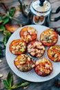 Healthy fall vegetarian dessert. Apple cupcake with pumpkin, almond seeds