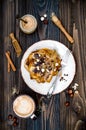 Healthy fall and winter breakfast. Vegan vanilla french toast with caramelized bananas, raw dark chocolate and hazelnut butter