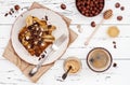 Healthy fall and winter breakfast. Vegan vanilla french toast with caramelized bananas, raw dark chocolate and hazelnut butter Royalty Free Stock Photo