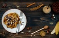 Healthy fall and winter breakfast. Vegan vanilla french toast with caramelized bananas, raw dark chocolate and hazelnut butter Royalty Free Stock Photo