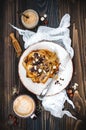 Healthy fall and winter breakfast. Vegan vanilla french toast with caramelized bananas, raw dark chocolate and hazelnut butter Royalty Free Stock Photo