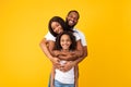 African American man posing with wife and smiling daughter Royalty Free Stock Photo