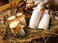 Healthy farm products. Aluminum cans and glass bottles with fresh natural milk on the hay in the hayloft of a dairy farm Royalty Free Stock Photo