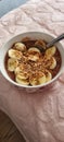 Healthy and fast breakfast oatmeal with cocoa and banana