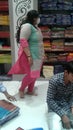 Healthy and fat female staff at textile showroom