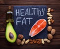 Healthy fat salmon, avocado, oil, nuts Royalty Free Stock Photo