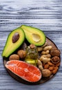 Healthy fat salmon, avocado, oil, nuts Royalty Free Stock Photo