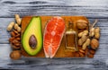 Healthy fat salmon, avocado, oil, nuts Royalty Free Stock Photo