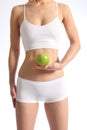 Healthy female torso white underwear holding apple