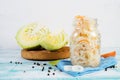 Healthy fermented vegetables in glass jars on a wooden background. Royalty Free Stock Photo