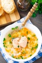 Healthy fish soup made of salmon