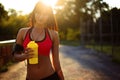 Healthy fitness girl with protein shake. Royalty Free Stock Photo