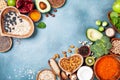 Healthy food background from fruits, vegetables, cereal, nuts and superfood. Dietary and balanced vegetarian eating products Royalty Free Stock Photo