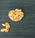 Healthy food for background image close up walnuts. Nuts texture on top view on the cup plate