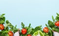 Healthy food background with various green herbs and vegetables. Ingredients for cooking salad. Vegetarian and vegan food concept Royalty Free Stock Photo