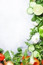 Healthy food background with various green herbs and vegetables. Ingredients for cooking salad. Vegetarian and vegan food concept Royalty Free Stock Photo