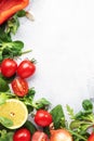 Healthy food background with various green herbs and vred egetables. Ingredients for cooking salad. Top view, copy space Royalty Free Stock Photo