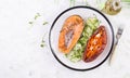 Healthy food: baked salmon and sweet potato and vegetables. Royalty Free Stock Photo