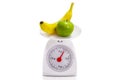 Healthy food on balance scale Royalty Free Stock Photo