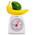 Healthy food on balance scale Royalty Free Stock Photo