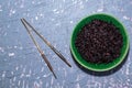 Healthy food black rice in bowl on grey background. Royalty Free Stock Photo