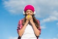 Healthy food choice. Little kid eat apple on sunny blue sky. Tooth-friendly food. Dental diet. Vitamin snack. Dental