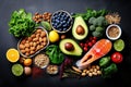 Healthy food clean eating selection: fish, fruits, vegetables, superfoods on dark background. Top view, Healthy food clean eating