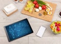 Healthy food composition with tablet Royalty Free Stock Photo