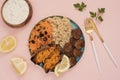 Healthy food concept. Clean eating. Meal with turkey meatballs, bulgur, sweet potato, carrot, salad. Pink and gold concept. Low ca