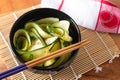 Healthy Food concept Cucumber Salad with soy sauce and Sesame Dressing in black bowl with copy space Royalty Free Stock Photo