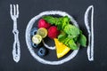 Healthy food concept. Fresh organic on a chalk painted fruit plate