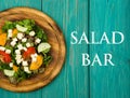 Healthy food concept - Fresh vegetable salad with greenery, tofu, tomatoes, cucumber and text Salad bar Royalty Free Stock Photo