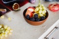 Full fruit breakfast bowl Grapes peach blackberry figs Healthy f