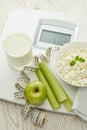 Healthy food concept. Slimming. Scales, measuring tape and healthy meal. Control of weight during the isolation period