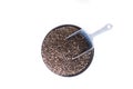 Healthy food concept super food dried Chia seed in black ceramic cup isolated on white background
