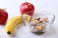 Healthy food with Corn Flakes cereal in a bowl, apple, banana and glass with milk. Morning breakfast. Royalty Free Stock Photo