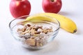 Healthy food with Corn Flakes cereal in a bowl, apple, banana and glass with milk. Morning breakfast. Royalty Free Stock Photo