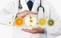 healthy food diet concept, Hands of nutritionist doctor with fruits Royalty Free Stock Photo