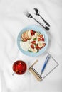 Healthy food, dragon fruit, berries, white tablecloth, blue plate, rusty, bowl, fresh fruit Royalty Free Stock Photo