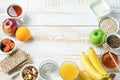 Healthy Food Fiber Sources Breakfast Oatmeal Honey Fruits Apples Banana Orange Juice Water Green Tea Nuts. White Plank Wood Table. Royalty Free Stock Photo