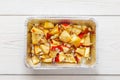 Healthy food in foil box, diet concept. Apple dessert Royalty Free Stock Photo