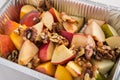 Healthy food in foil box, diet concept. Apple dessert Royalty Free Stock Photo