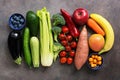 Healthy food, fresh raw colored fruits, vegetables and berries. Clean food for vegans and vegetarians. View from above Royalty Free Stock Photo