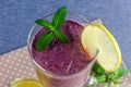 Healthy food, fresh smoothies from currants and blueberries with lemon Royalty Free Stock Photo