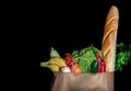 Healthy food in full paper bag of different products vegetables and fruits Royalty Free Stock Photo