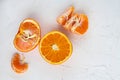 Healthy food, halved fresh orange and pieces of tangerines Royalty Free Stock Photo