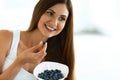 Healthy Food. Happy Woman On Diet Eating Organic Blueberries Royalty Free Stock Photo