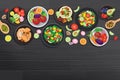 Healthy food with ingredients on the dark wooden table background