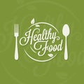 Healthy food logo. Plate with fork and spoon concept on green background